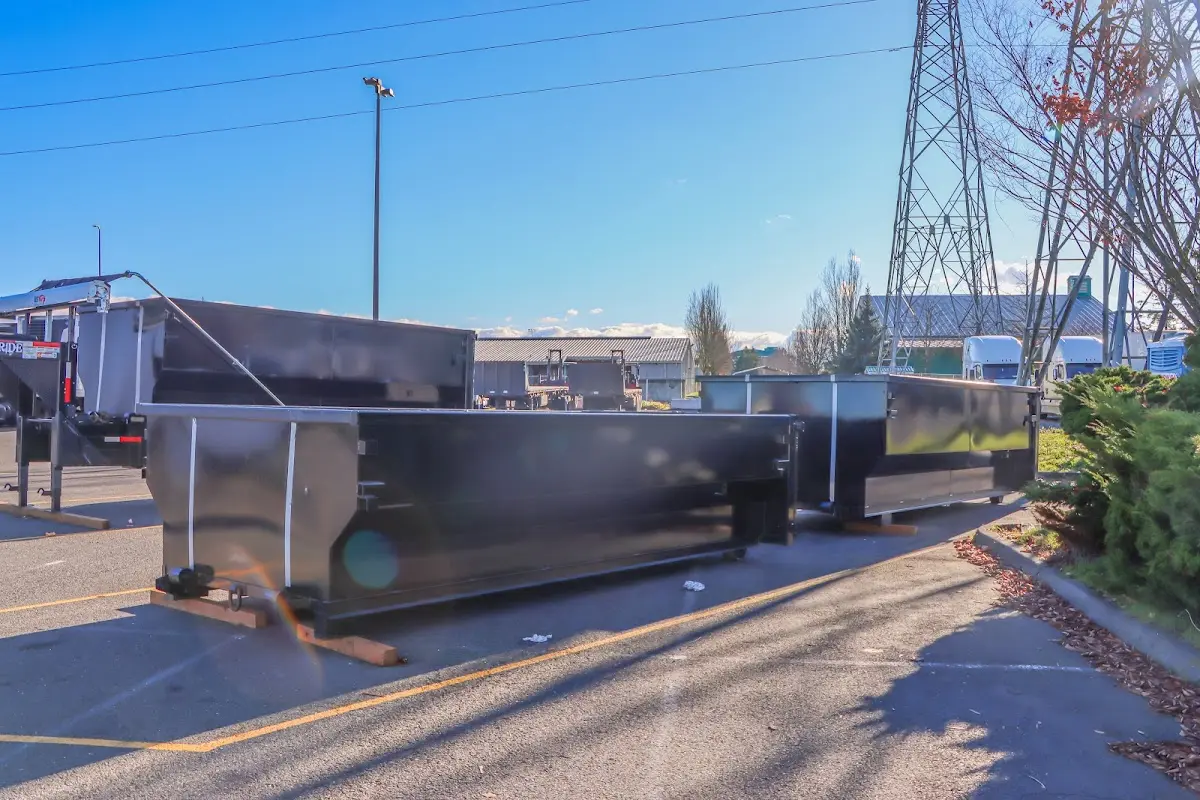 Roll-off dumpster ready for waste disposal at job site for Commercial Dumpster Rental in Boaz